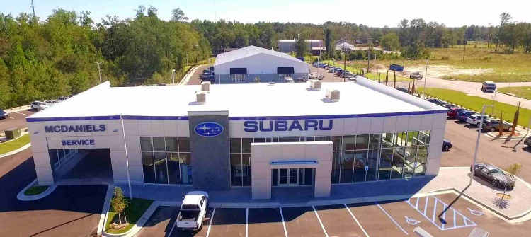 exterior of McDaniels Subaru with white roof