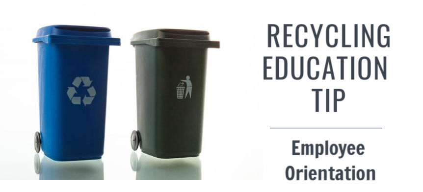 Blue recycling bin and black trash can