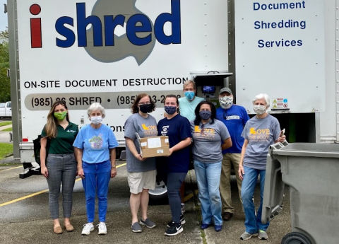 group of workers at paper shredding event