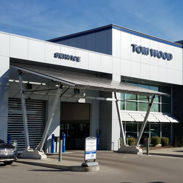 Subaru retailer with solar EV charging canopy in front